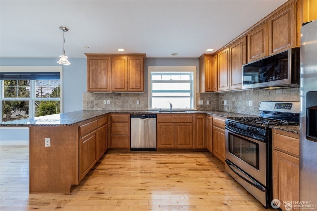Photo of 5033 12th Avenue NE #B, Seattle, WA 98105 (MLS # 2543084)