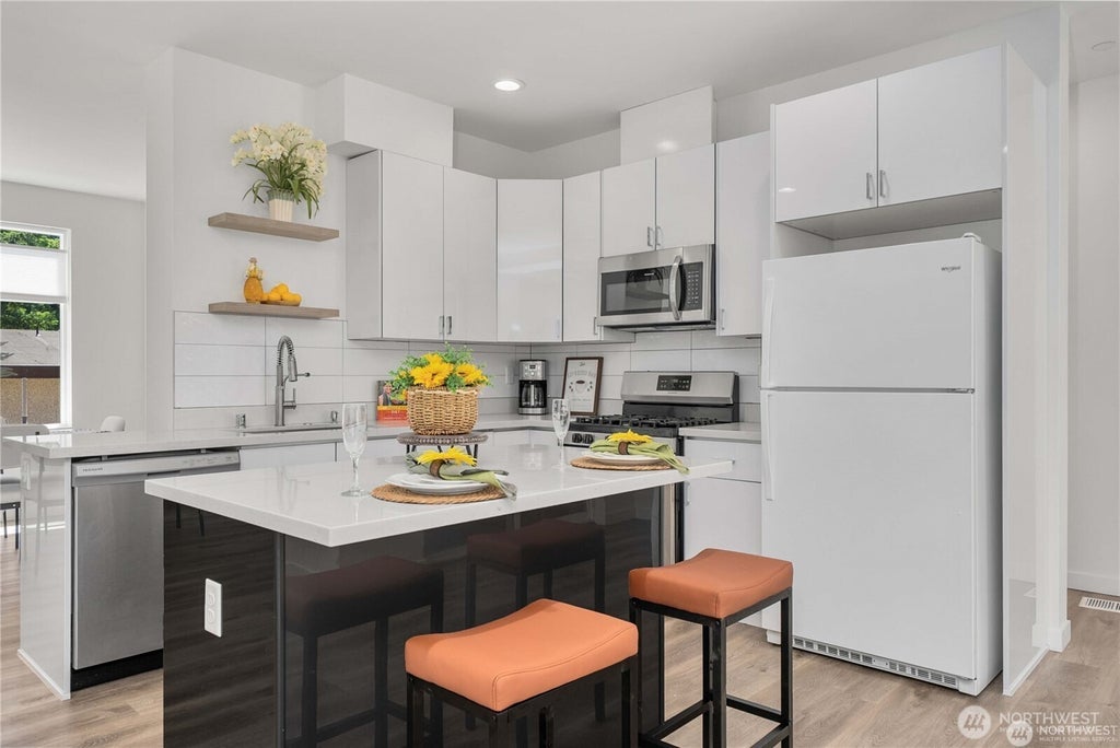 Photo of 15612 8th Avenue SW #104, Burien, WA 98166 (MLS # 2585809)