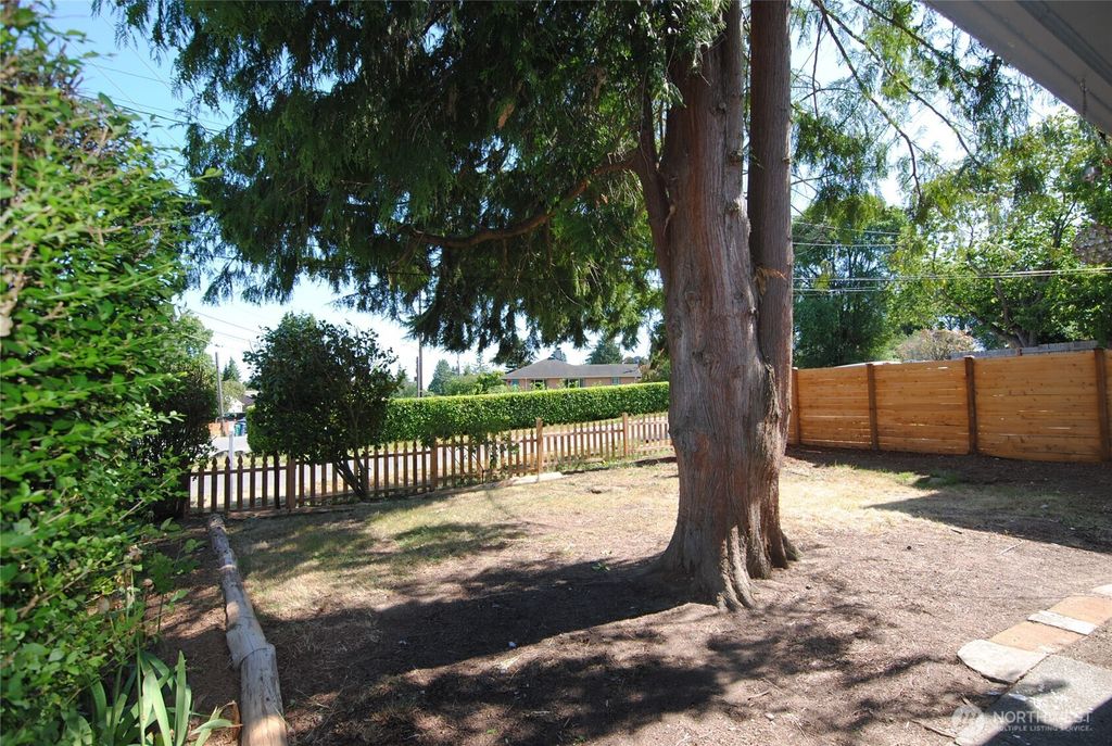 Photo of 130 S 108th Place, Seattle, WA 98168 (MLS # 2401911)