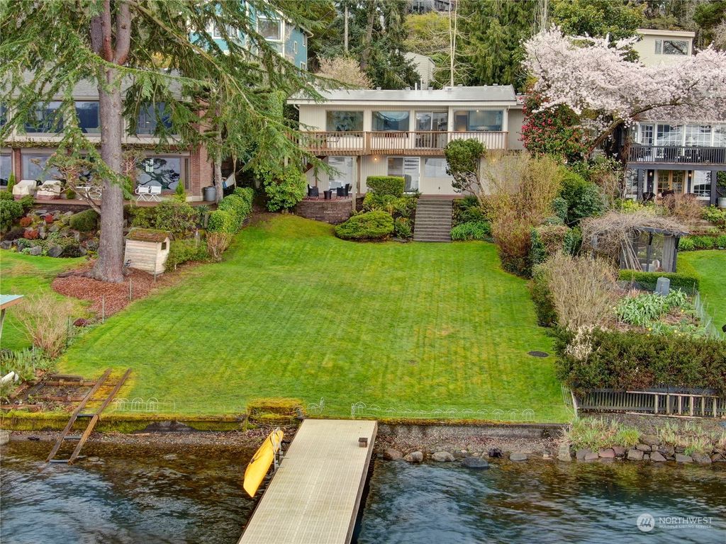 Photo of 8760 Sand Point Way Way NE, Seattle, WA 98115 (MLS # 2215510)