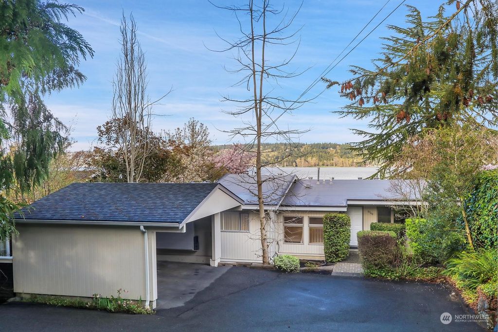 Photo of 8760 Sand Point Way Way NE, Seattle, WA 98115 (MLS # 2215510)