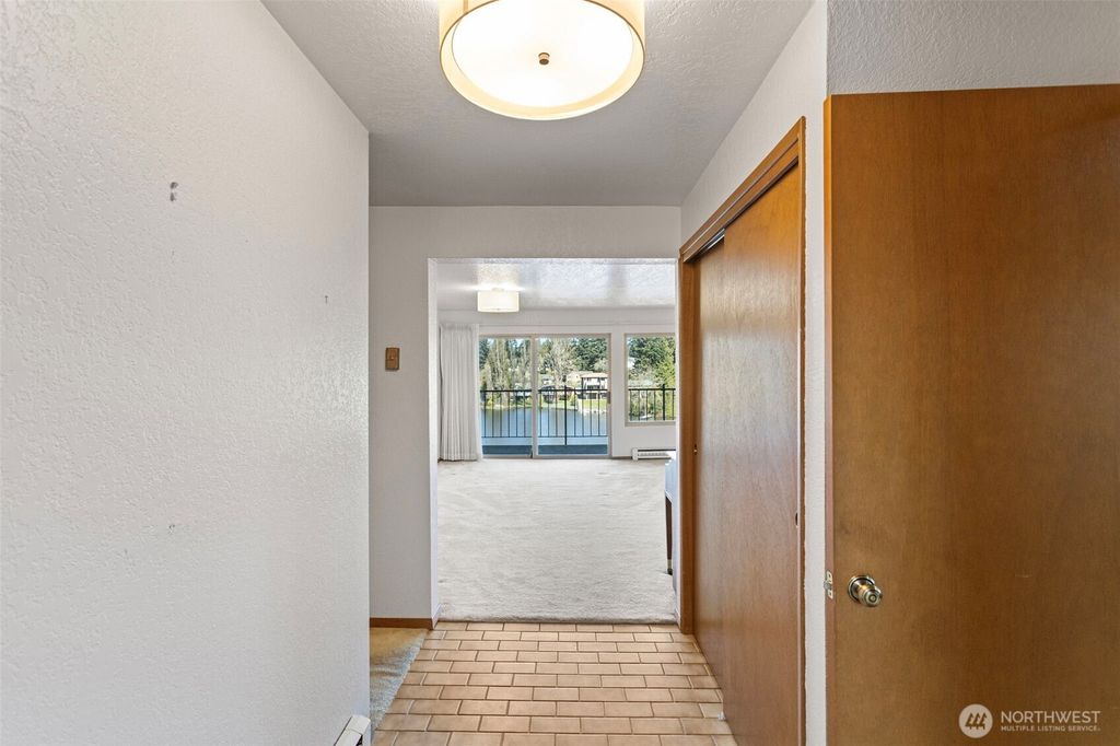 Photo of 322 N 134th St St #406, Seattle, WA 98133 (MLS # 2505495)