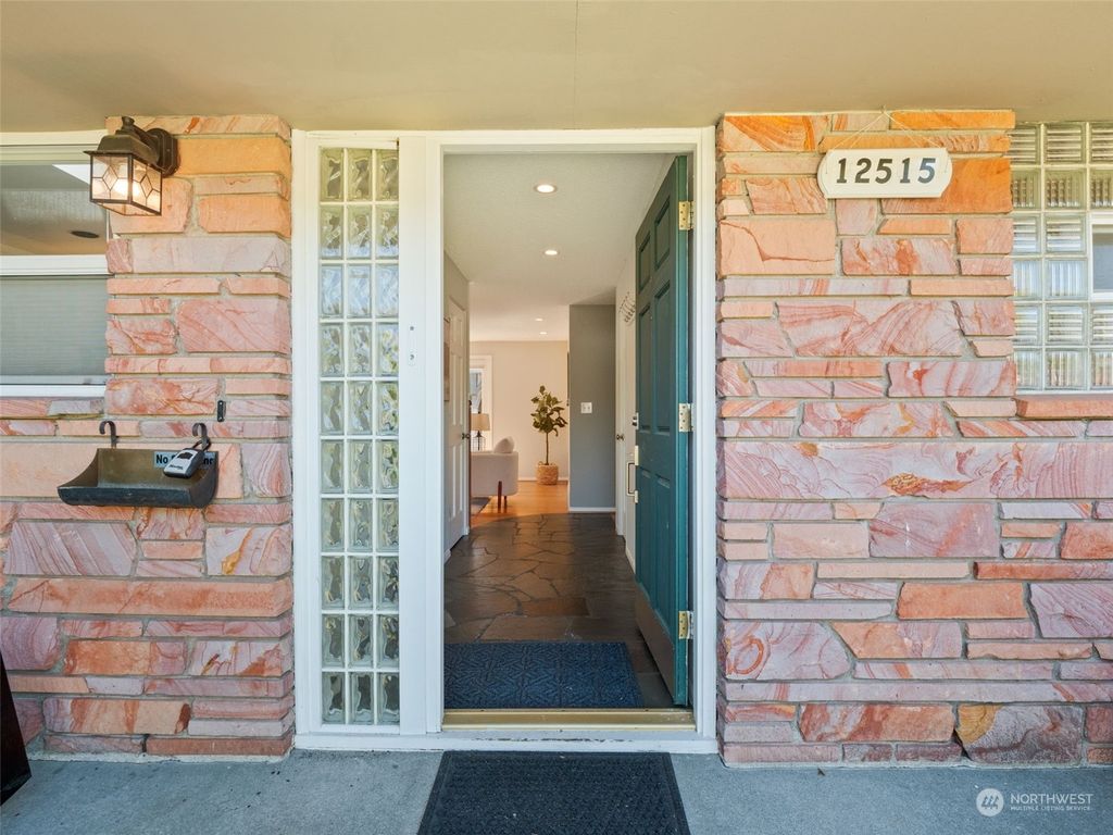 Photo of 12515 11th Avenue NW, Seattle, WA 98177 (MLS # 2257042)