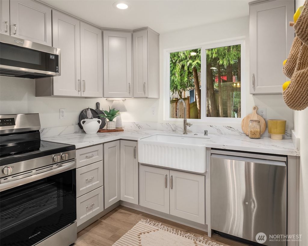 Photo of 12517 22nd Avenue NE, Seattle, WA 98125 (MLS # 2523278)