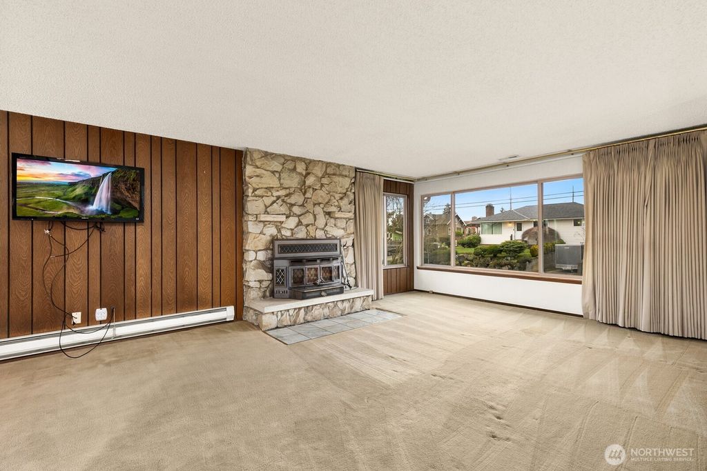 Photo of 10411 57th Avenue S, Seattle, WA 98178 (MLS # 2493112)