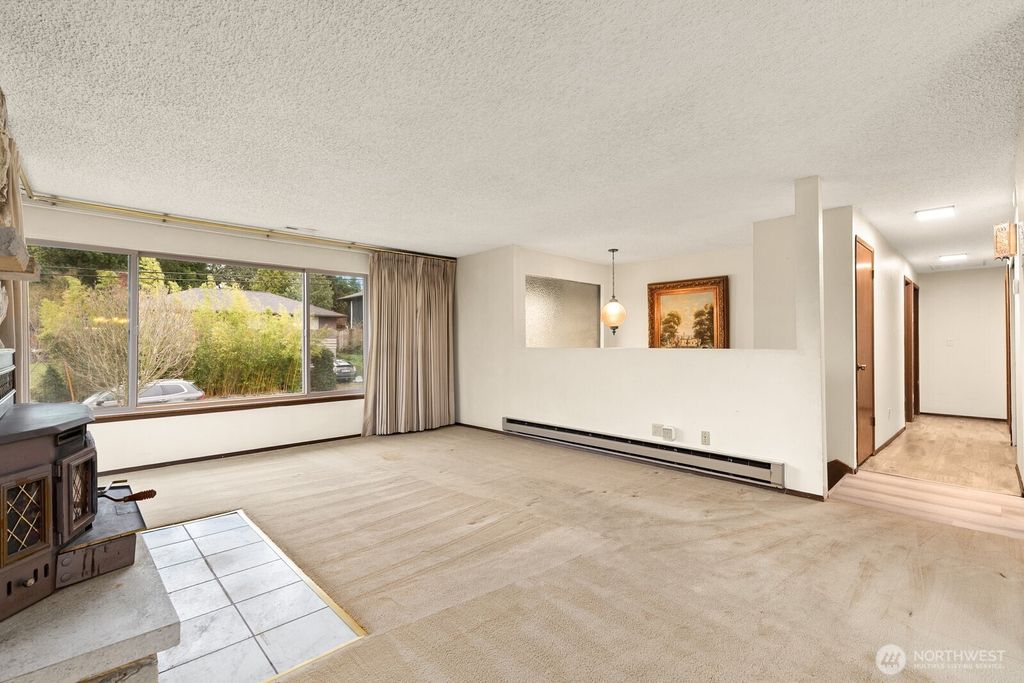 Photo of 10411 57th Avenue S, Seattle, WA 98178 (MLS # 2493112)