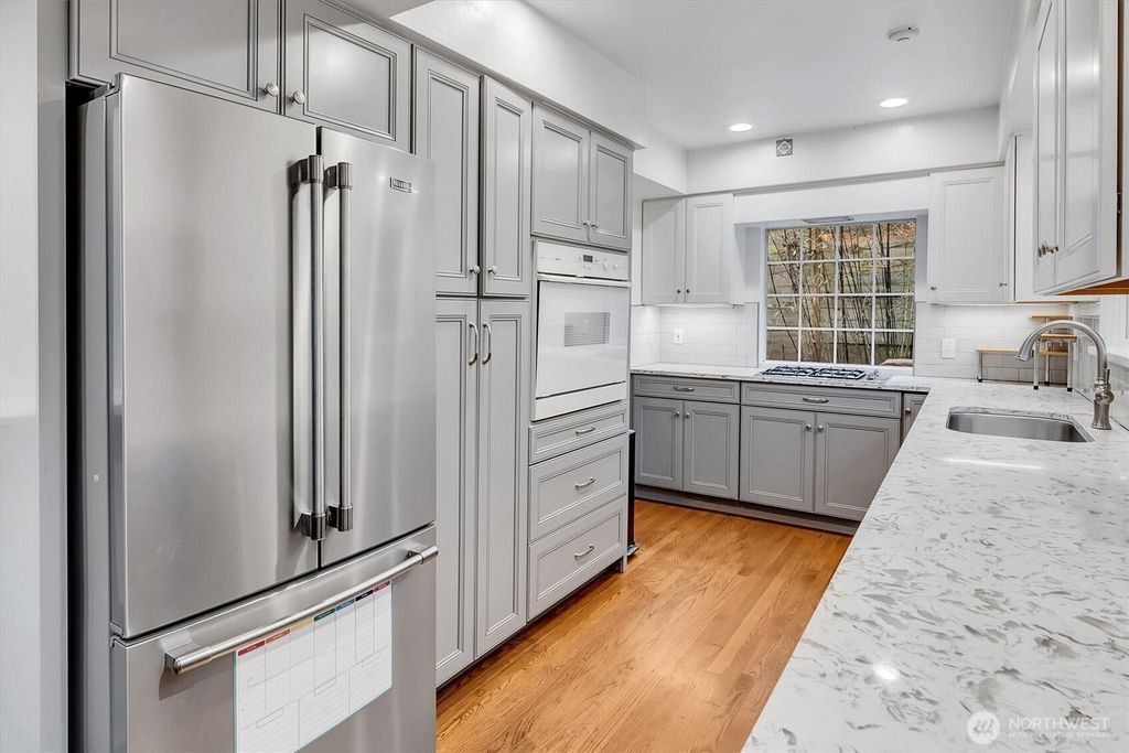 Photo of 1252 NE 89th Street, Seattle, WA 98115 (MLS # 2488322)