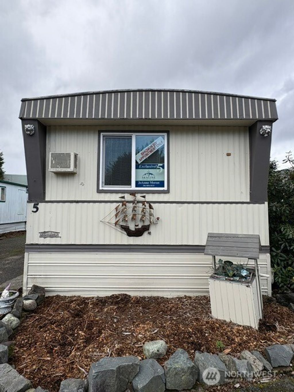 Photo of 7031 NE 175th Street #5, Kenmore, WA 98028 (MLS # 2464968)