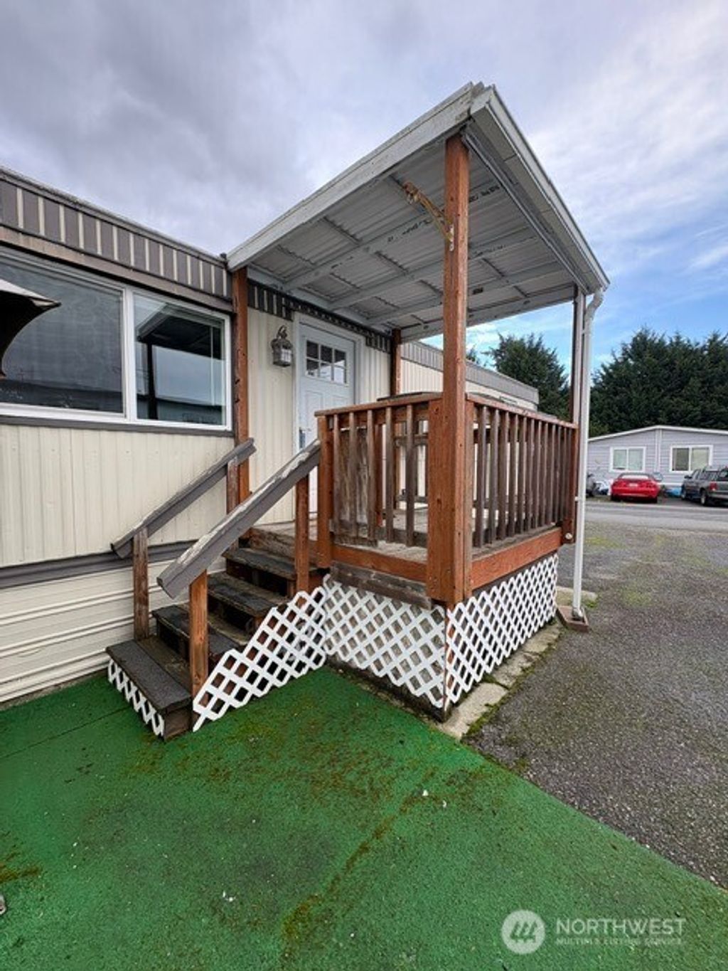 Photo of 7031 NE 175th Street #5, Kenmore, WA 98028 (MLS # 2464968)