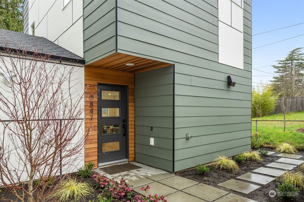 Photo of 8847 30th Avenue SW, Seattle, WA 98126 (MLS # 2205038)