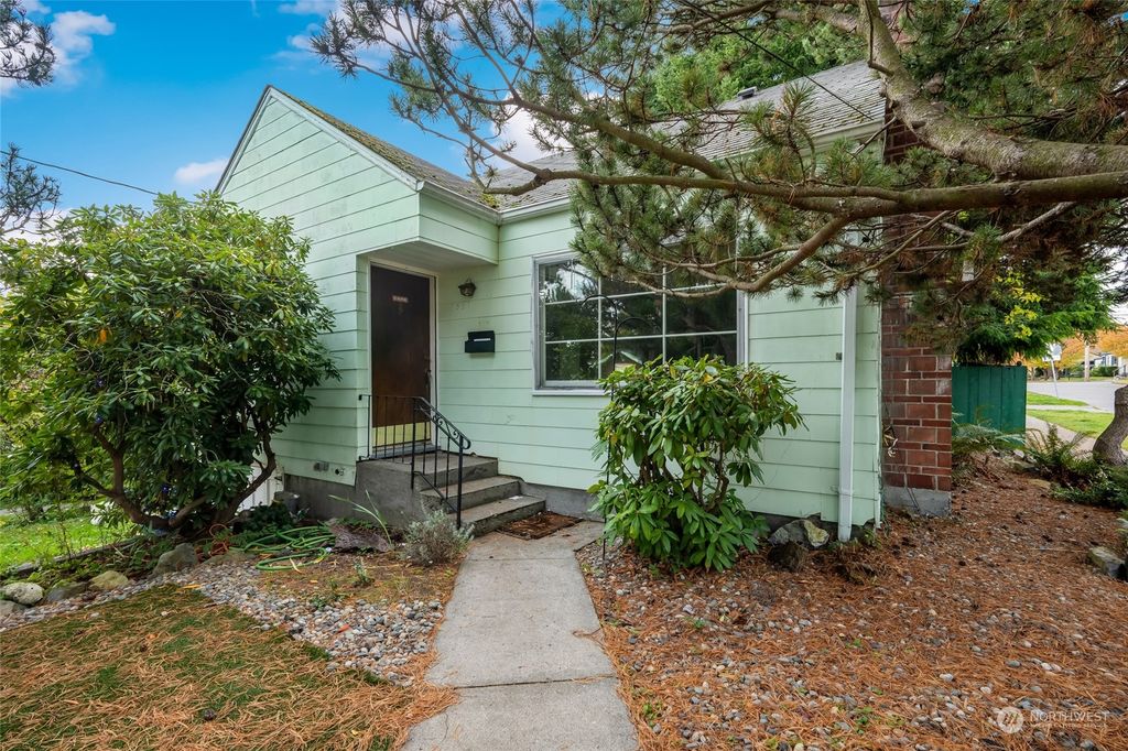 Photo of 7557 27th Avenue NW, Seattle, WA 98117 (MLS # 2306051)