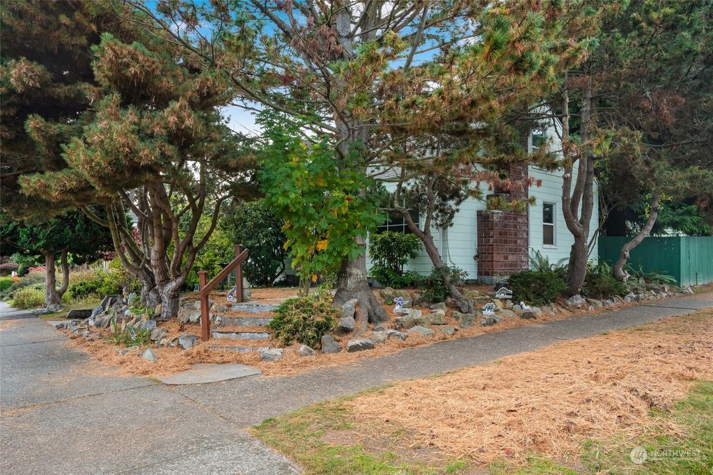 Photo of 7557 27th Avenue NW, Seattle, WA 98117 (MLS # 2306051)