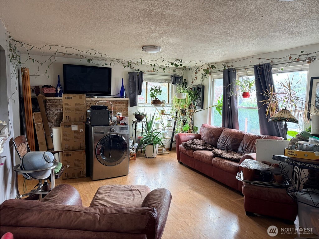 Photo of 8629 16th Avenue SW, Seattle, WA 98106 (MLS # 2586718)