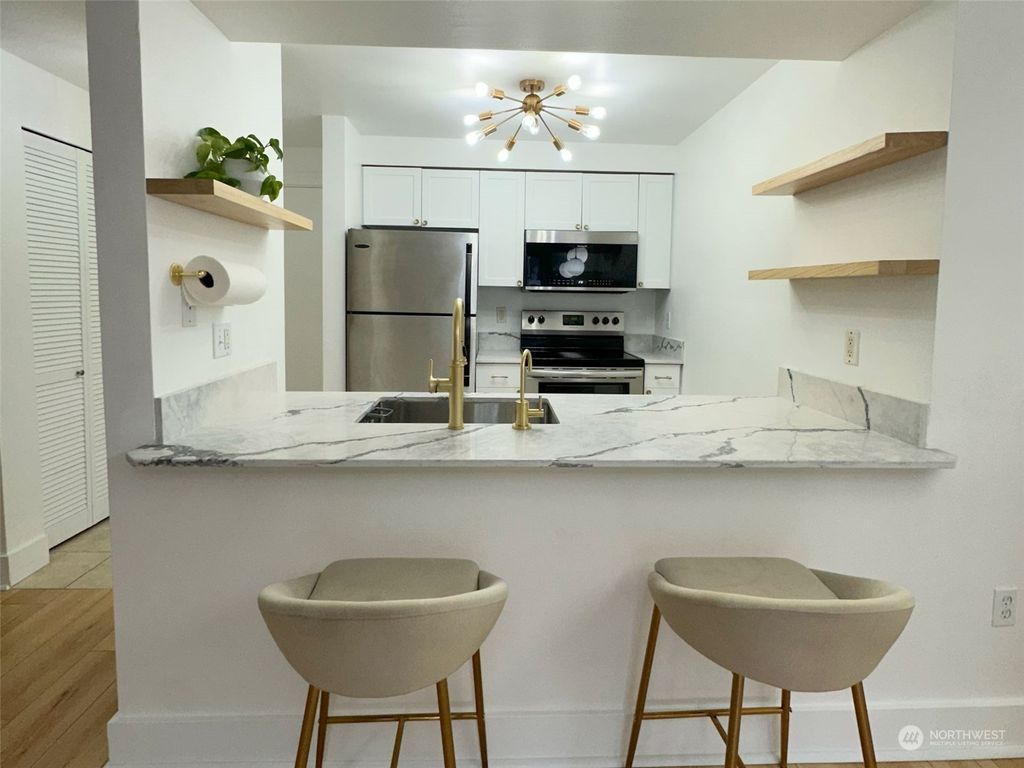 Photo of 4831 Fauntleroy SW #107, Seattle, WA 98116 (MLS # 2324925)