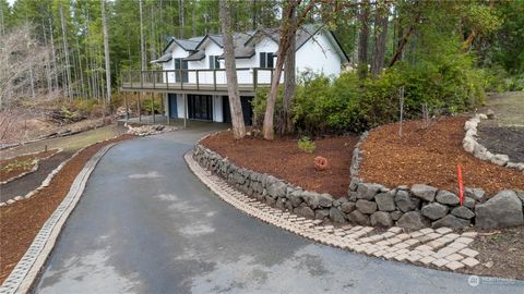 Photo of 451 E Hillside Drive, Belfair, WA 98528 (MLS # 2029019)