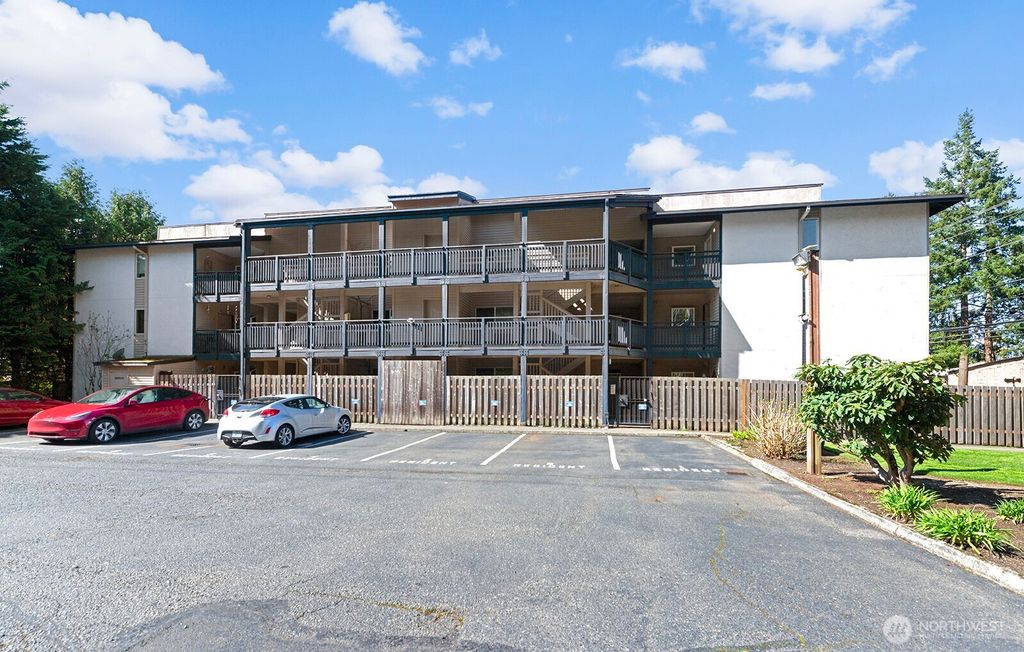 Photo of 12303 SE 60th Street #3A, Bellevue, WA 98006 (MLS # 2487074)