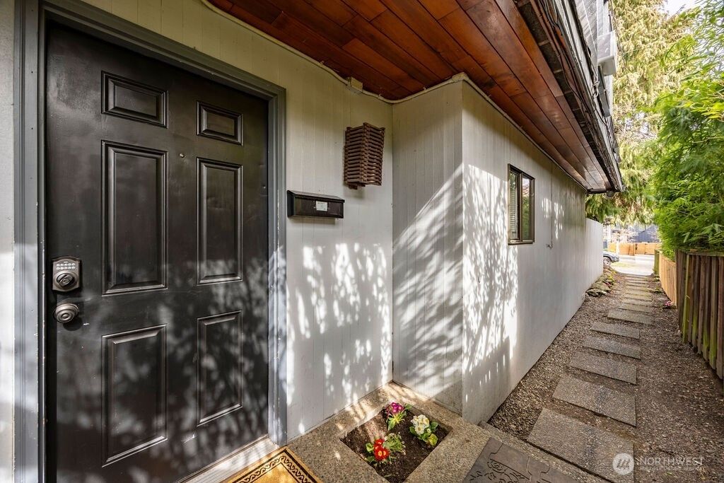 Photo of 4407 Thackeray Place NE, Seattle, WA 98105 (MLS # 2334344)