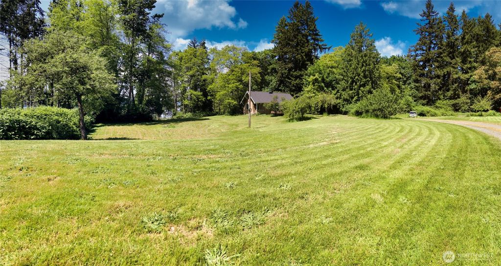 Photo of 6810 NE Bergman Road, Bainbridge Island, WA 98110 (MLS # 2462909)