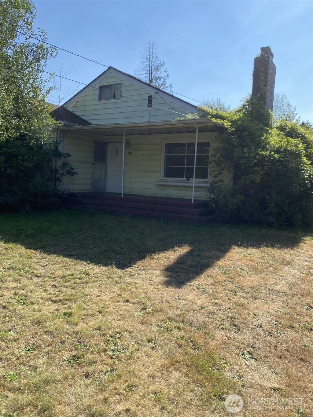 Photo of 9711 12th Avenue NW, Seattle, WA 98117 (MLS # 2554195)