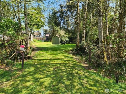 Photo of 284 Duck Lake Drive NE, Ocean Shores, WA 98569 (MLS # 2447600)