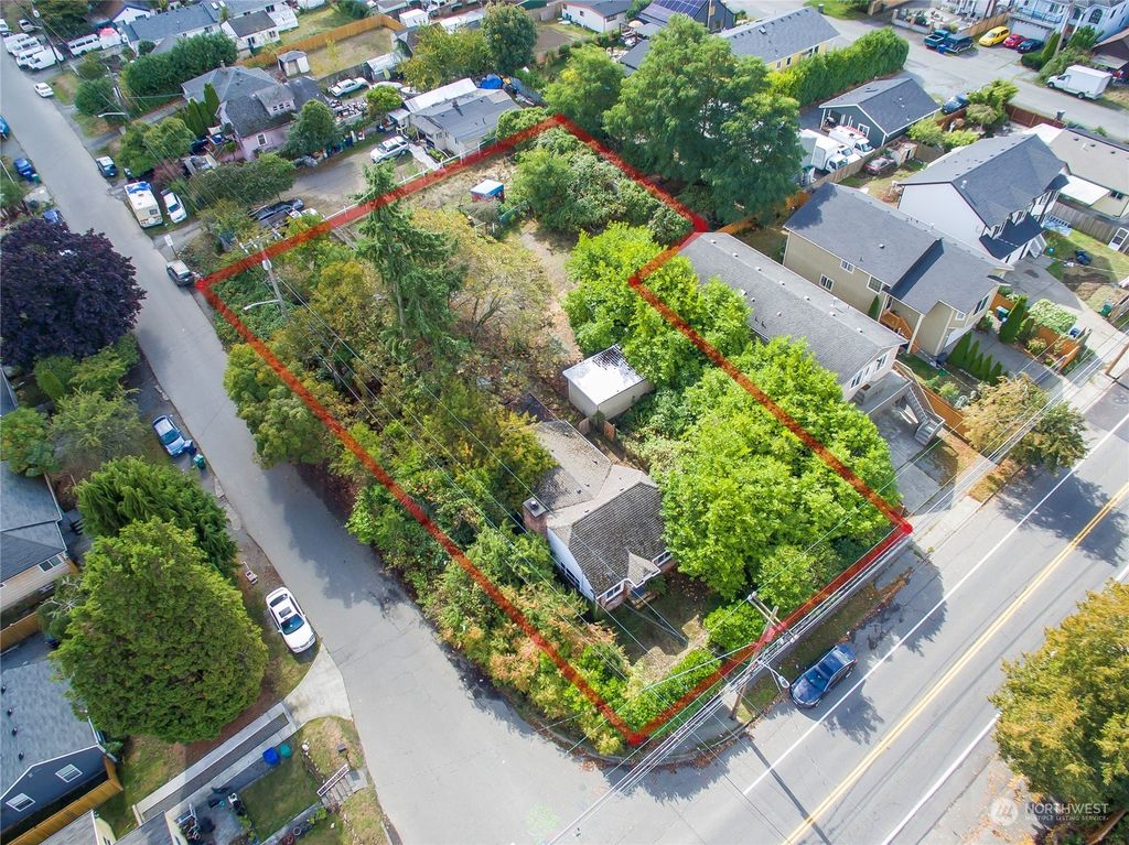 Photo of 103 SW 108th Street, Seattle, WA 98146 (MLS # 2166428)