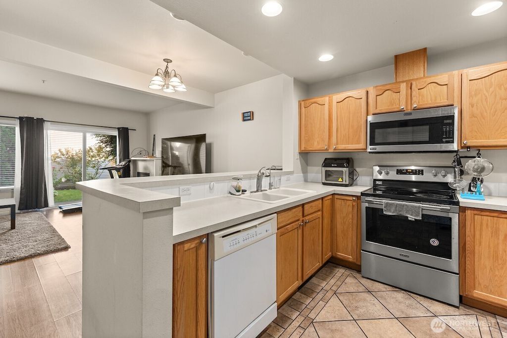 Photo of 418 SE 17th Street St #10B, Auburn, WA 98002 (MLS # 2437080)