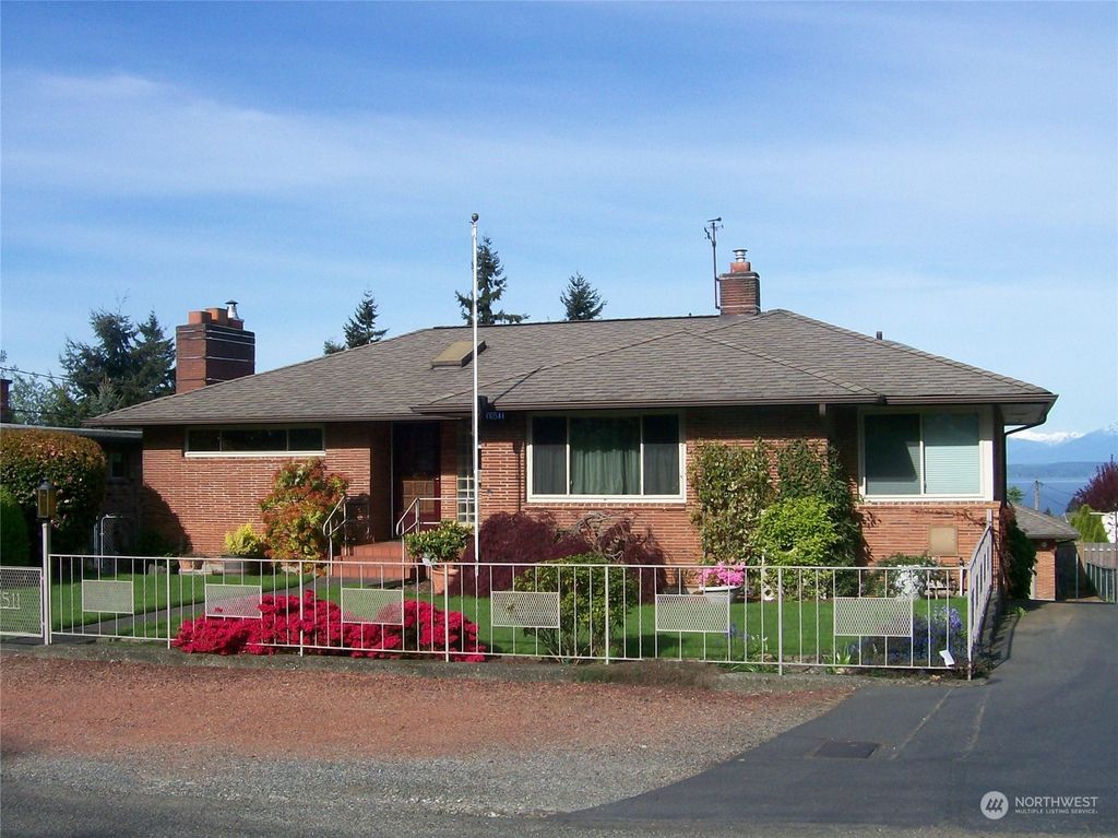 Photo of 11511 4th Avenue NW, Seattle, WA 98177 (MLS # 2135937)