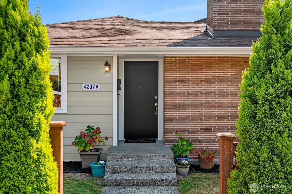 Photo of 4207 SW Thistle St #A, Seattle, WA 98136 (MLS # 2426051)