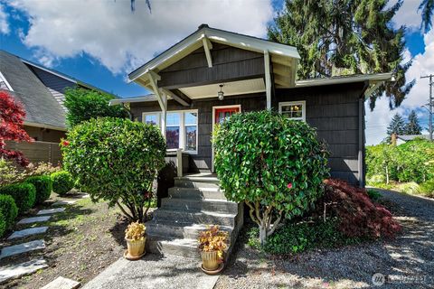Photo of 8403 32nd Avenue SW, Seattle, WA 98126 (MLS # 2480209)