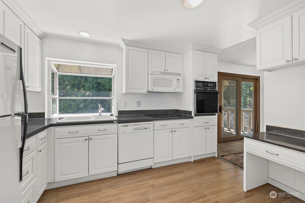 Photo of 8703 NE 137th Street, Kirkland, WA 98034 (MLS # 2078336)