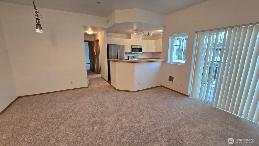 Photo of 21907 42nd Avenue S #203, Kent, WA 98032 (MLS # 2478376)