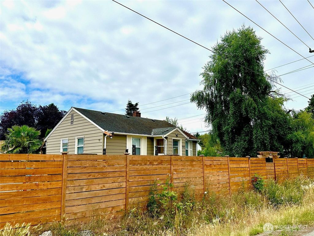 Photo of 10204 19th Avenue SW, Seattle, WA 98146 (MLS # 2402813)