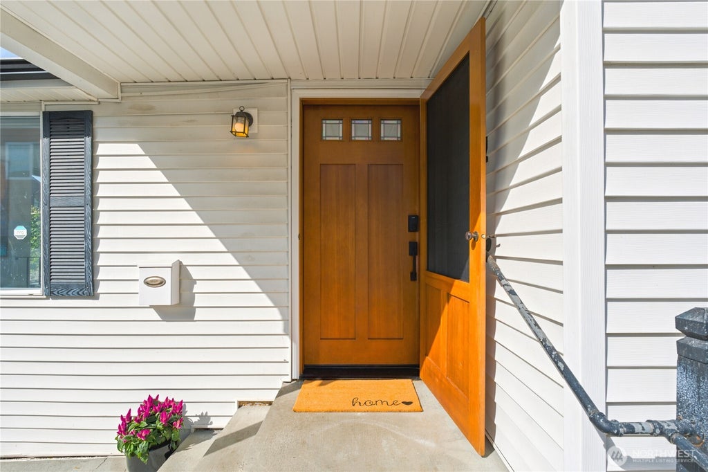 Photo of 8012 25th Avenue NW, Seattle, WA 98117 (MLS # 2578672)