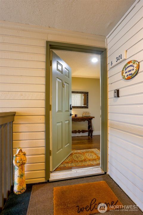 Photo of 20161 Viking Crest Loop NE #5-301, Poulsbo, WA 98370 (MLS # 2467385)