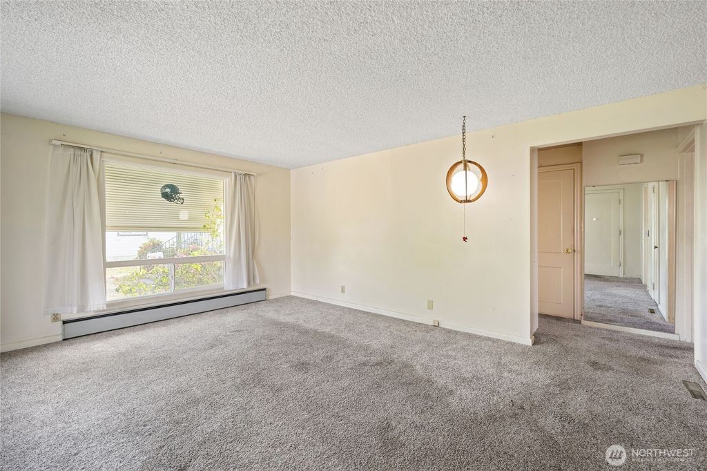 Photo of 8608 16th Avenue SW, Seattle, WA 98106 (MLS # 2387149)