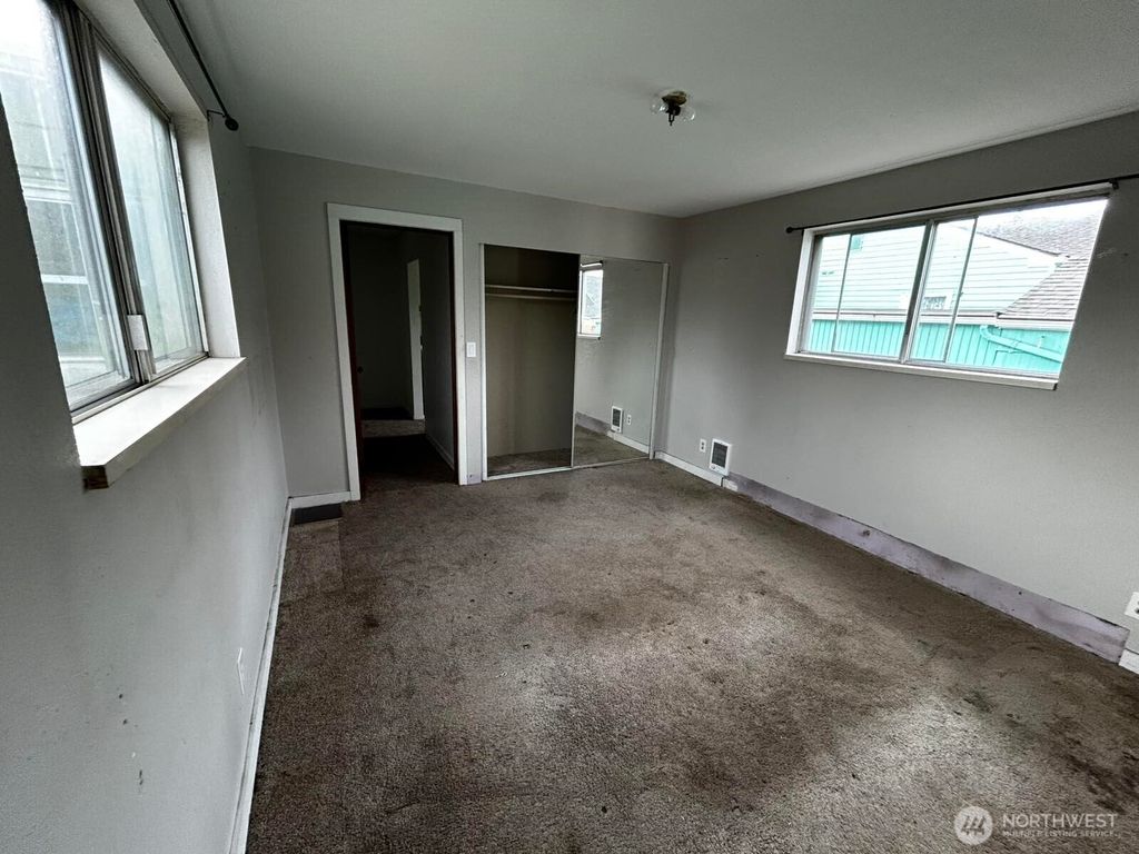 Photo of 703 117th Street S, Tacoma, WA 98444 (MLS # 2458618)