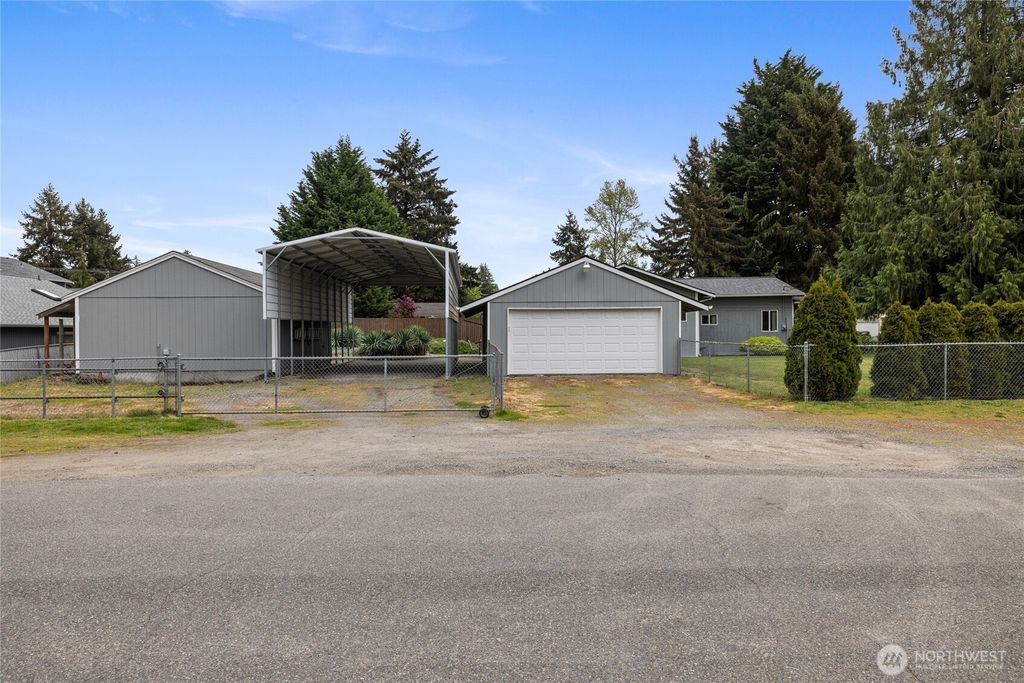 Photo of 827 99th St S St, Tacoma, WA 98444 (MLS # 2515505)