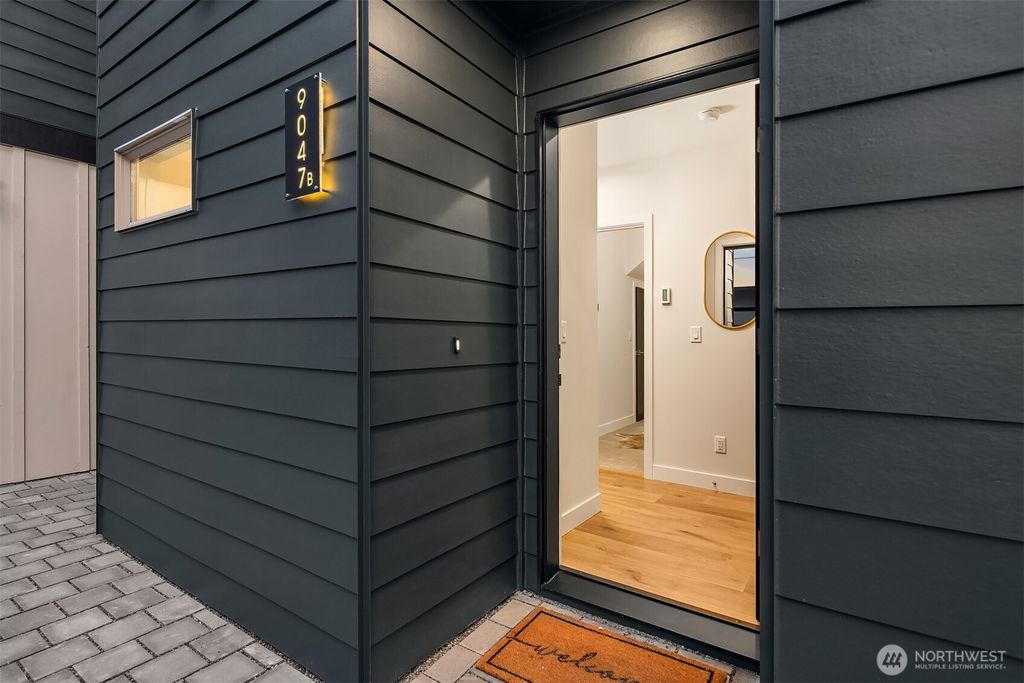 Photo of 9047 Dibble Avenue NW #B, Seattle, WA 98117 (MLS # 2395568)