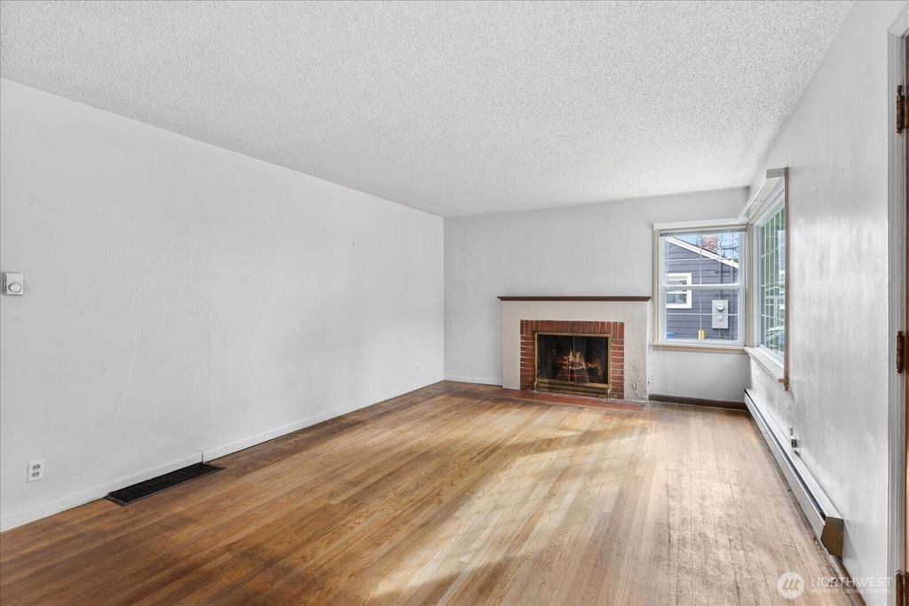 Photo of 12042 5th Avenue NE, Seattle, WA 98125 (MLS # 2342607)