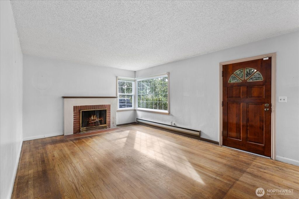 Photo of 12042 5th Avenue NE, Seattle, WA 98125 (MLS # 2342607)