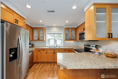 Photo of 7701 Beacon Place NE #103, Bremerton, WA 98311 (MLS # 2406963)