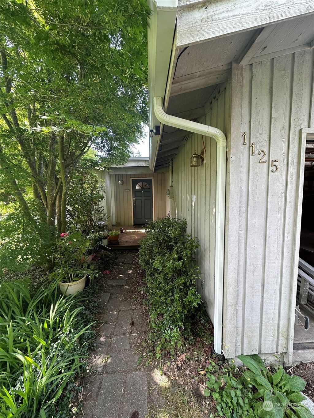 Photo of 1125 NE 152nd Street, Shoreline, WA 98155 (MLS # 2133620)