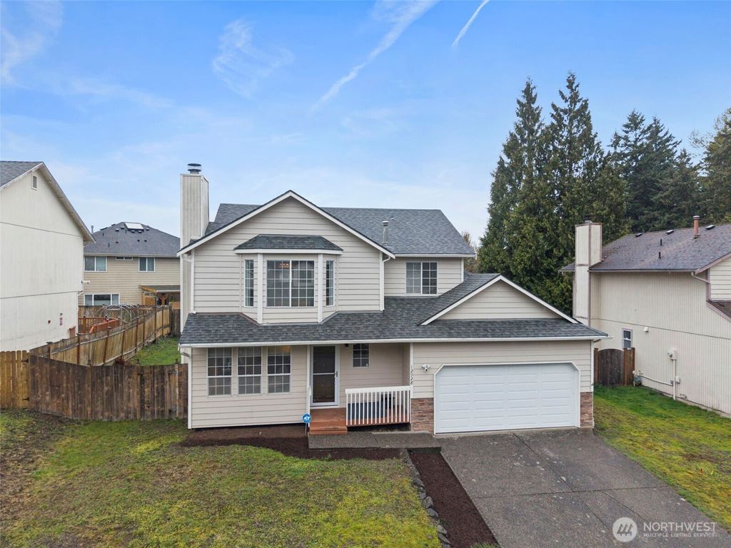 Photo of 12928 SE 217th Place, Kent, WA 98031 (MLS # 2510458)