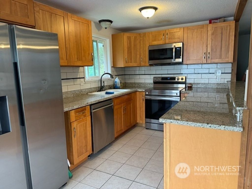 Photo of 3429 136th St St SW, Lynnwood, WA 98087 (MLS # 2267950)