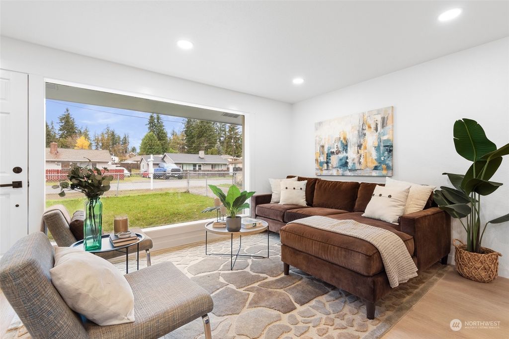 Photo of 3419 NE 6TH Place, Renton, WA 98056 (MLS # 2314174)