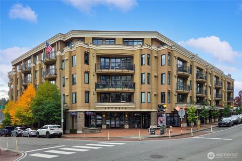 Photo of 10047 Main Street #311, Bellevue, WA 98004 (MLS # 2444670)