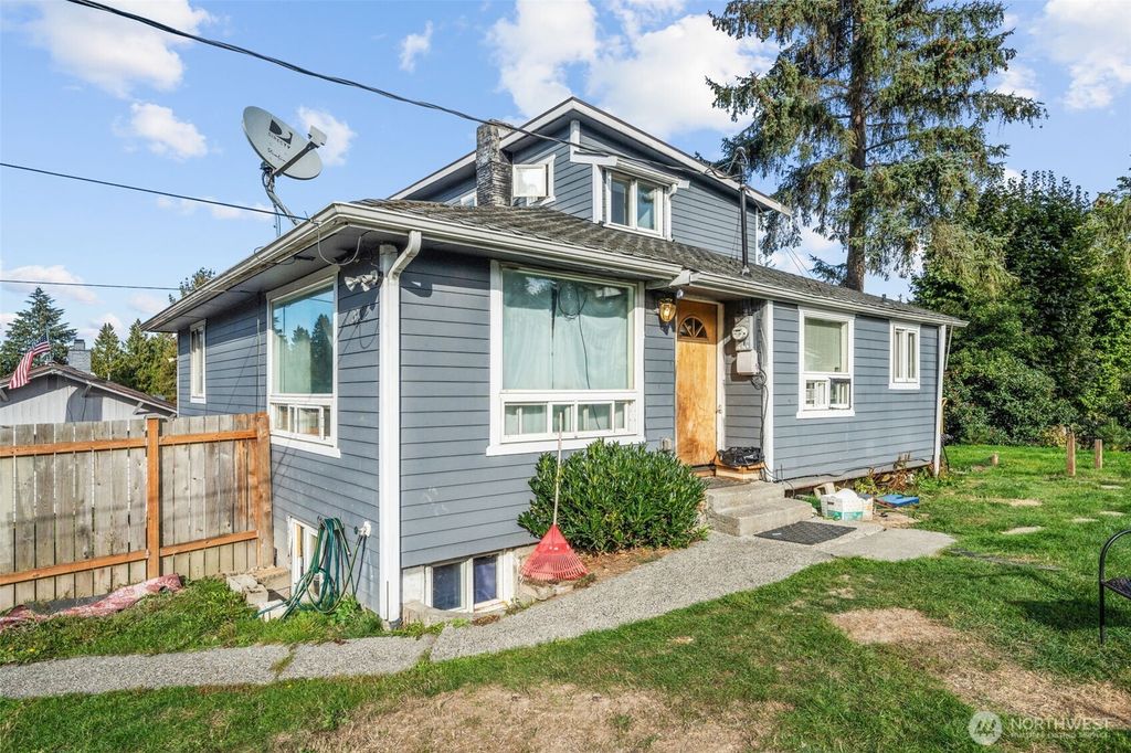 Photo of 11852 8th Avenue S, Seattle, WA 98168 (MLS # 2444179)