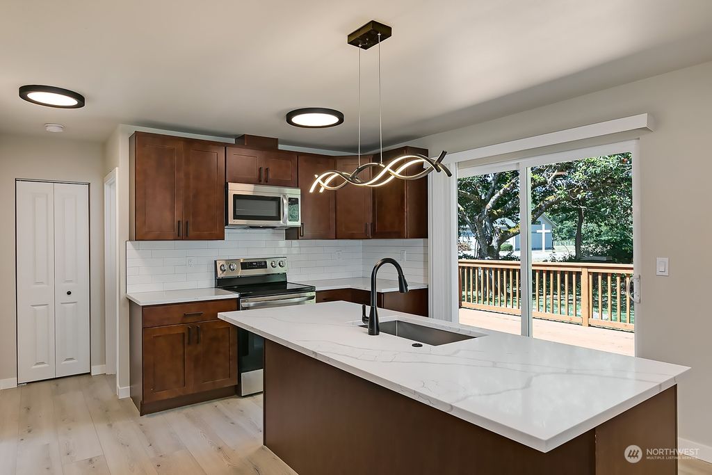 Photo of 320 NE 8TH Street, North Bend, WA 98045 (MLS # 2025884)