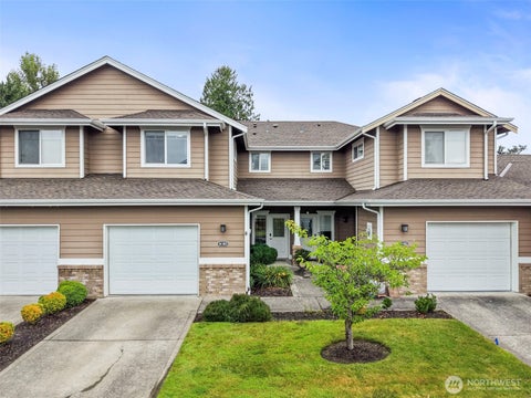 Photo of 10700 SE 260th Street #M102, Kent, WA 98030 (MLS # 2548799)