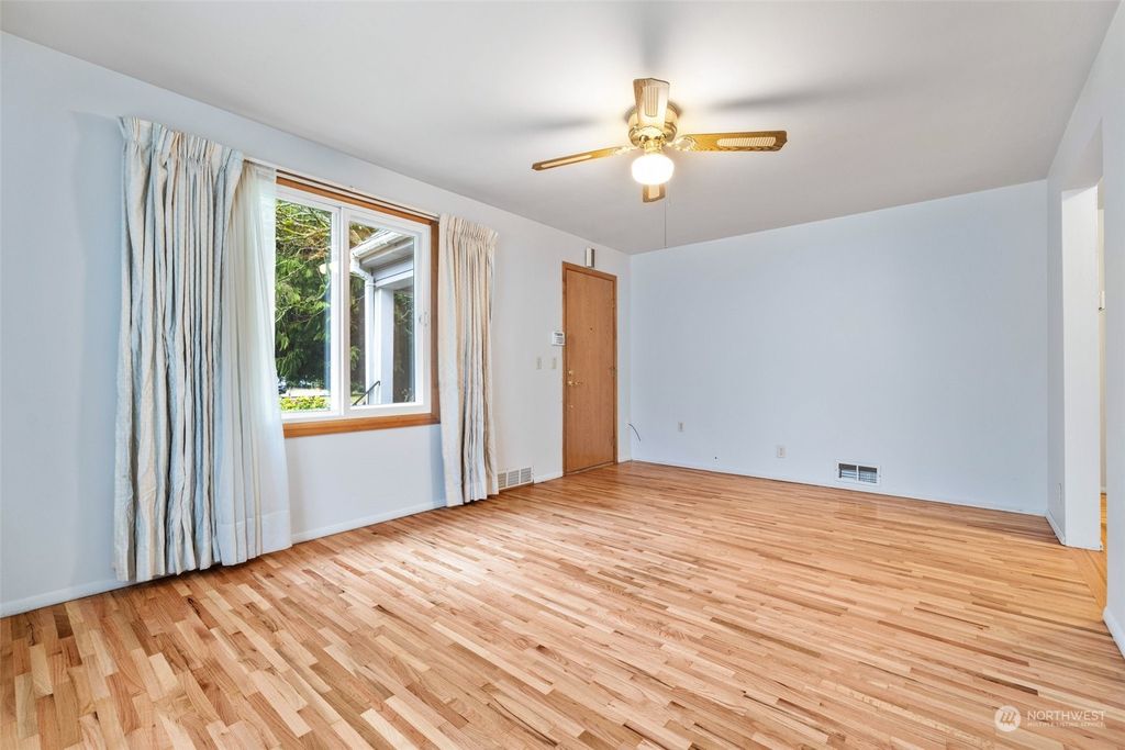Photo of 12058 10th Avenue S, Seattle, WA 98168 (MLS # 2030050)